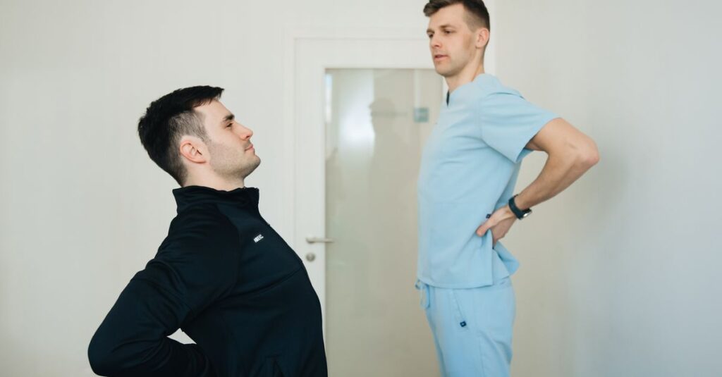 A physiotherapist instructs a patient on back exercises in a clinic setting.